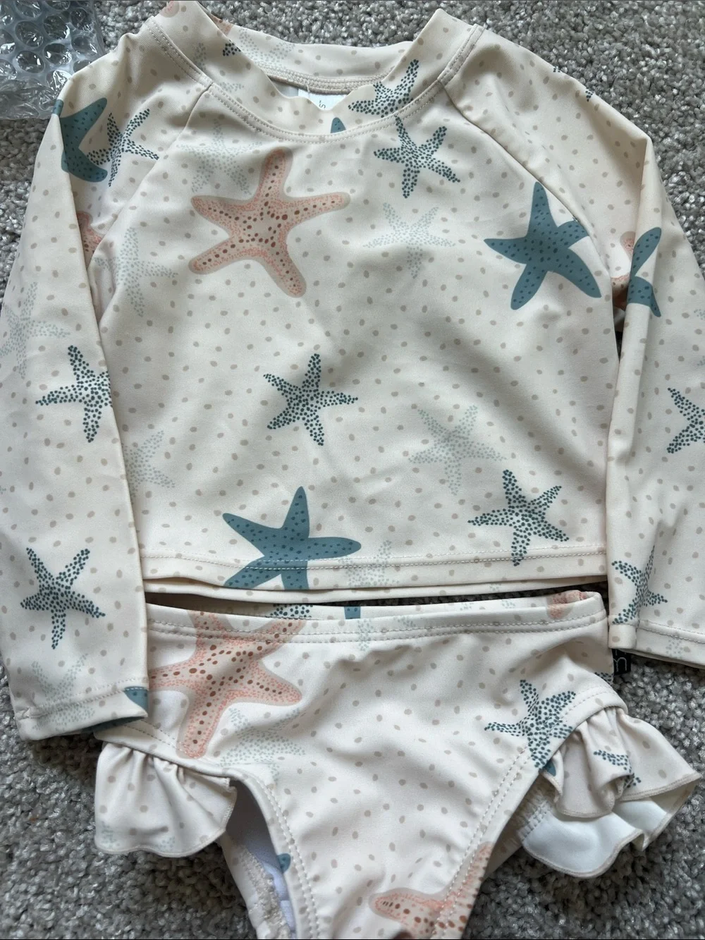 Cream Starfish Rashguard Set for Kids - Long Sleeve Swim Top & Ruffle Bottoms